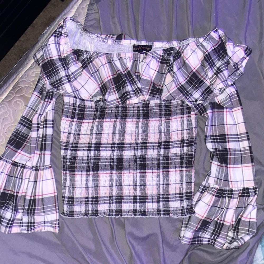 Large “Most Famous” Off shoulder crop top sweater.